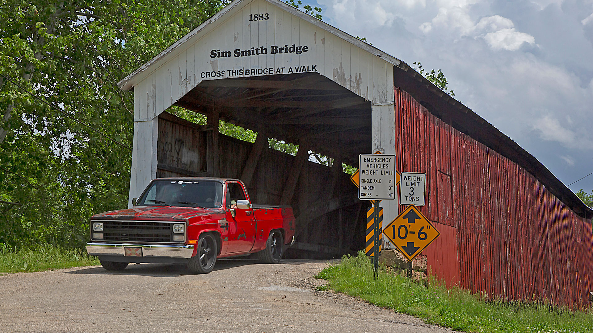 Chevrolet C10 Square Body driving acroos Sim Smith Bridge Covered Bridge