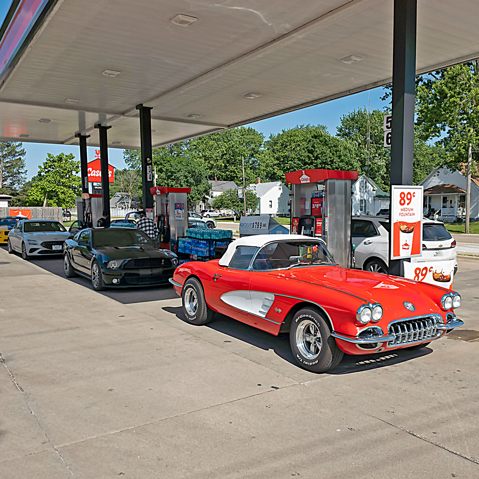 Classic cars at gas station