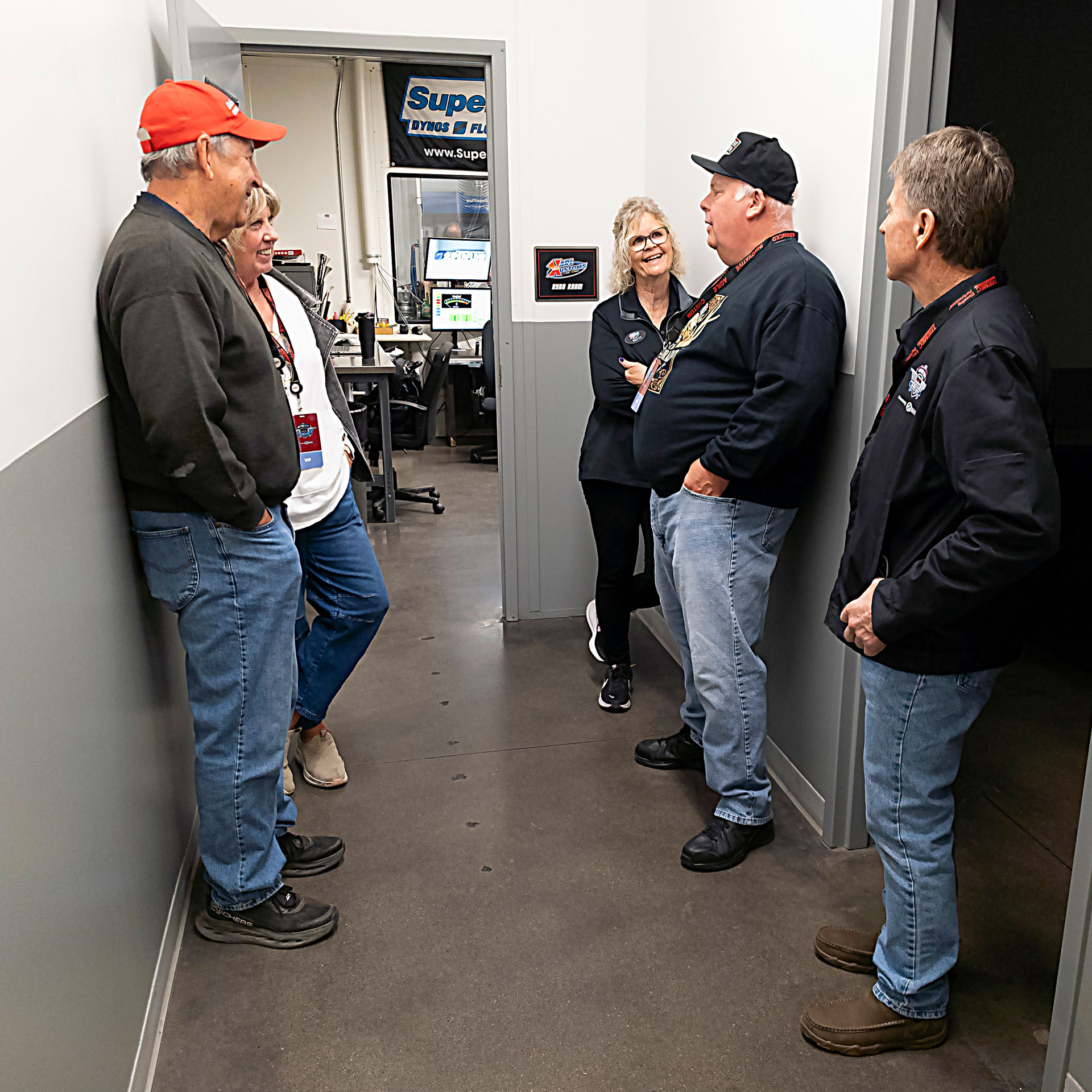 Jeff Smith talking with Pavement Pounder Events participants and Patti from Karl Kustoms