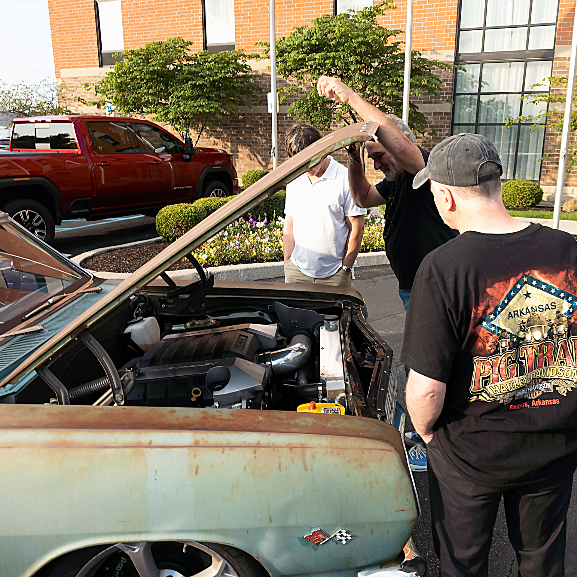 Checking out the engine in a 1965 Chevelle Station Wagon