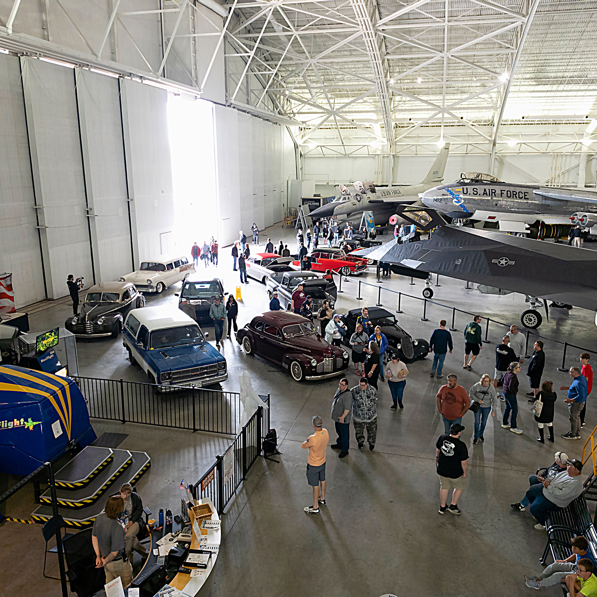 Classic cars parked inside Strategic Air Command bomber museum