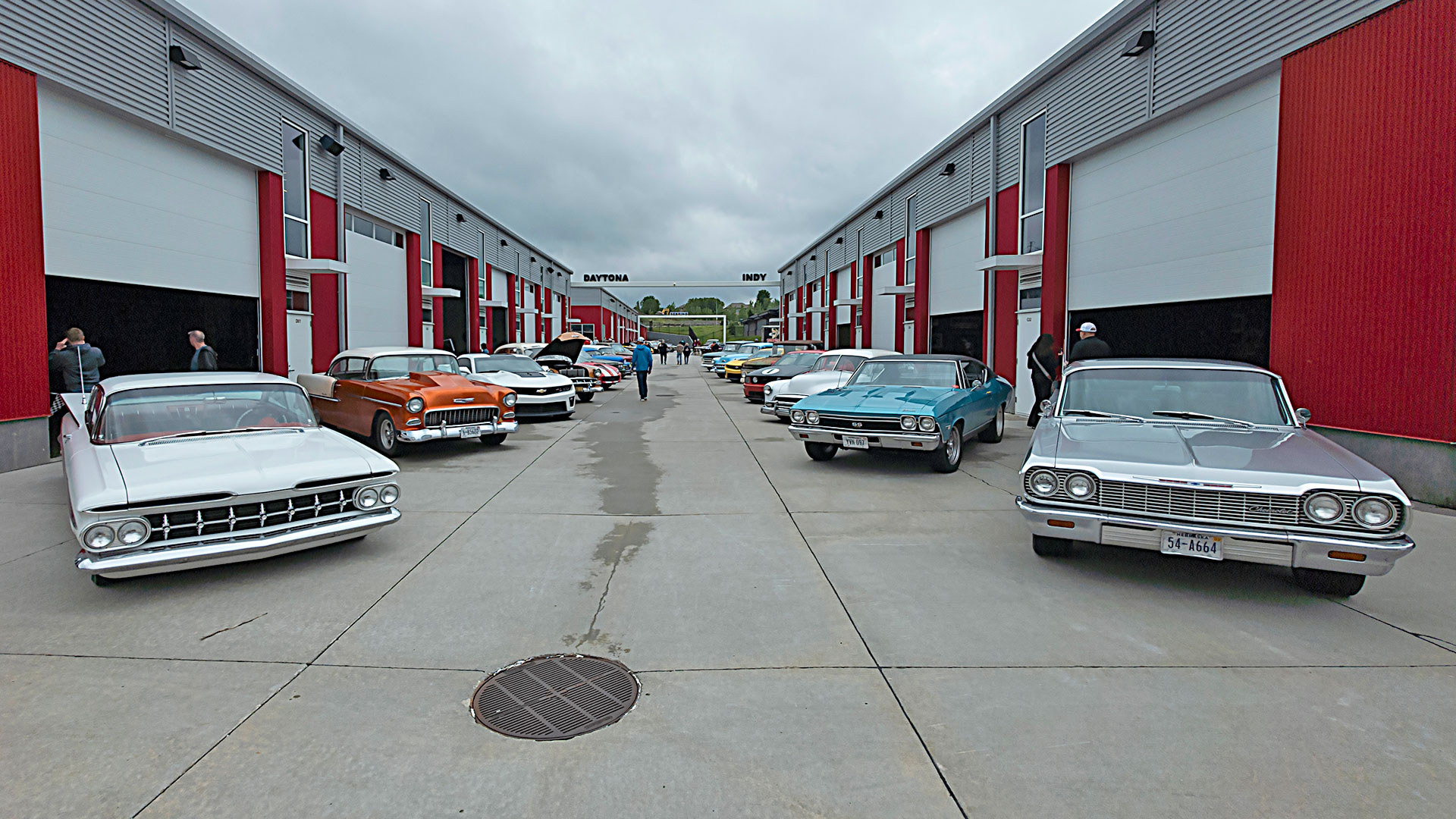 Classic cars parked at Victory Lane condo garages